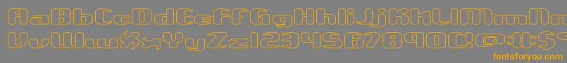 フォントUnexploredGalaxiesWoBrk – オレンジの文字は灰色の背景にあります。
