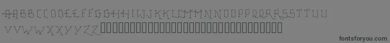 フォントFancyTattooScript – 黒い文字の灰色の背景