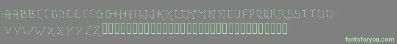 FancyTattooScript-fontti – vihreät fontit harmaalla taustalla