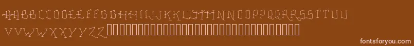 FancyTattooScript-Schriftart – Rosa Schriften auf braunem Hintergrund
