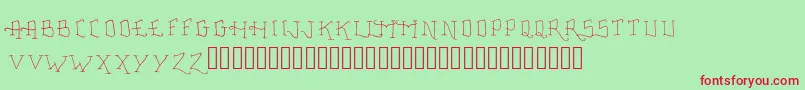 フォントFancyTattooScript – 赤い文字の緑の背景