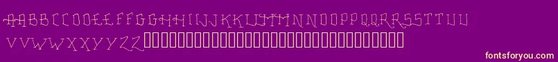 FancyTattooScript-Schriftart – Gelbe Schriften auf violettem Hintergrund