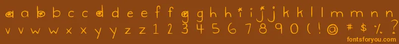 Czcionka DjbGimmeSpace – pomarańczowe czcionki na brązowym tle