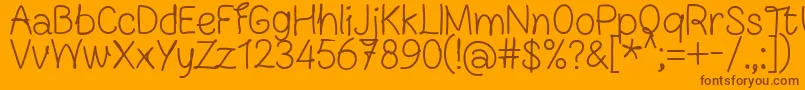 Fonte FnBlocknoteHandRegular – fontes marrons em um fundo laranja
