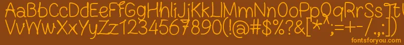 FnBlocknoteHandRegular Font – Orange Fonts on Brown Background