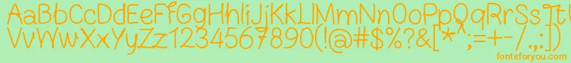 FnBlocknoteHandRegular-Schriftart – Orangefarbene Schriften auf grünem Hintergrund