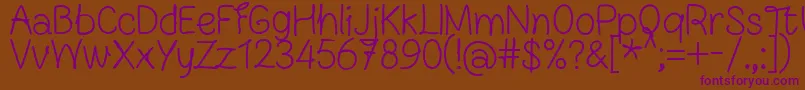 FnBlocknoteHandRegular Font – Purple Fonts on Brown Background