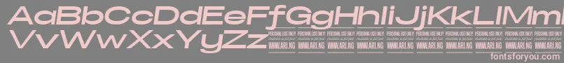 フォントSpecifypersonalExexpbolditalic – 灰色の背景にピンクのフォント