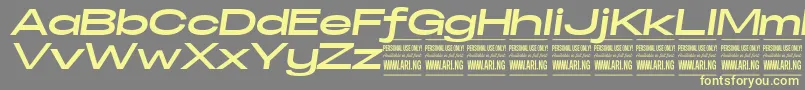 SpecifypersonalExexpbolditalic Font – Yellow Fonts on Gray Background