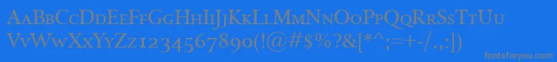 フォントIsoldeSmallcaps – 青い背景に灰色の文字