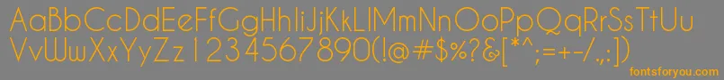 Caviardreams-Schriftart – Orangefarbene Schriften auf grauem Hintergrund