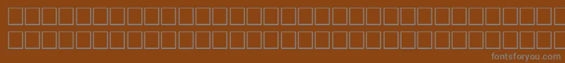 Шрифт NoldeRegular – серые шрифты на коричневом фоне