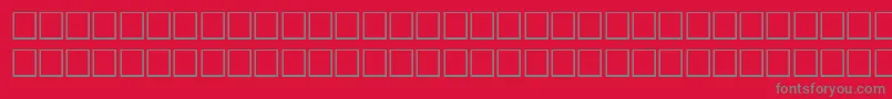 フォントNoldeRegular – 赤い背景に灰色の文字