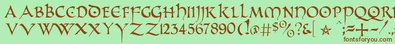 PrUncialAlternateCapitals-fontti – ruskeat fontit vihreällä taustalla