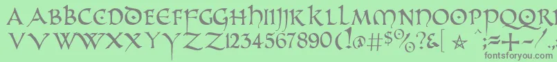 フォントPrUncialAlternateCapitals – 緑の背景に灰色の文字