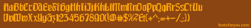 Pittoresk-Schriftart – Orangefarbene Schriften auf braunem Hintergrund