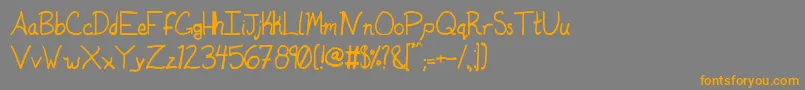 フォントDuntonsophisticated – オレンジの文字は灰色の背景にあります。