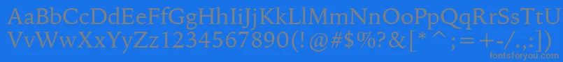BitstreamIowanOldStyleBt-fontti – harmaat kirjasimet sinisellä taustalla