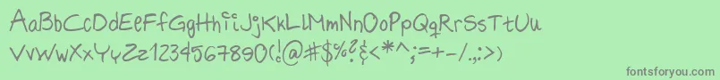 フォントHildeSharpie – 緑の背景に灰色の文字