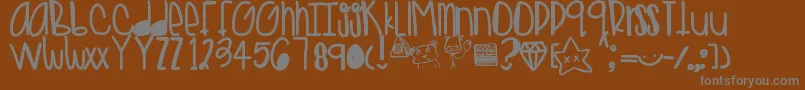Goldenteddys Font – Gray Fonts on Brown Background