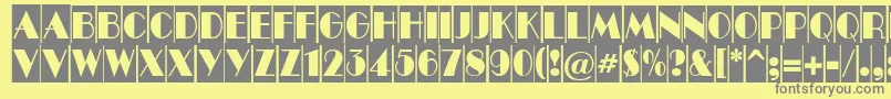 ABenttitulcmnr-Schriftart – Graue Schriften auf gelbem Hintergrund