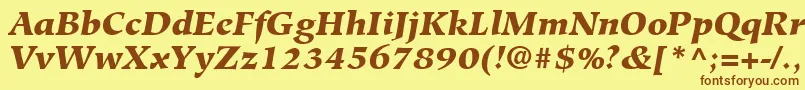 フォントHiroshigeLtBlackItalic – 茶色の文字が黄色の背景にあります。