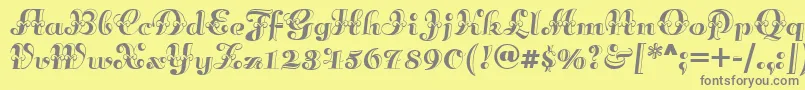 Annabellematineenf-Schriftart – Graue Schriften auf gelbem Hintergrund