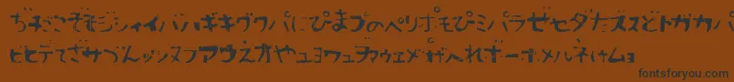 フォントSushitaro – 黒い文字が茶色の背景にあります