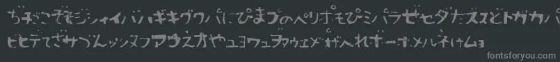 フォントSushitaro – 黒い背景に灰色の文字