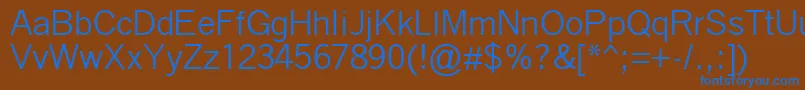 QuicktypeIi-Schriftart – Blaue Schriften auf braunem Hintergrund