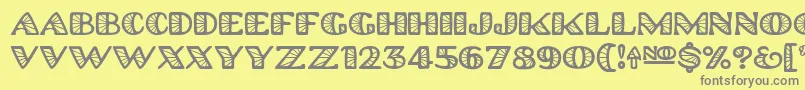 フォントPlatinum Hub Caps Spoked – 黄色の背景に灰色の文字