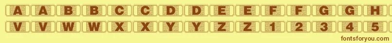 Weitere Informationen zur Stagtickets-Schriftart Stagtickets-Schriftart – Braune Schriften auf gelbem Hintergrund