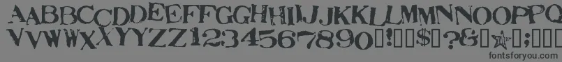 StampActJumbled-Schriftart – Schwarze Schriften auf grauem Hintergrund