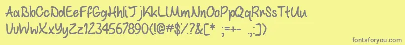 Fonte WhiteChocolateMintTtf – fontes cinzas em um fundo amarelo