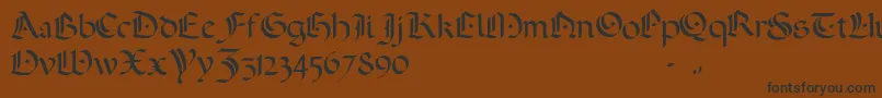 Czcionka ADarkWedding2007 – czarne czcionki na brązowym tle