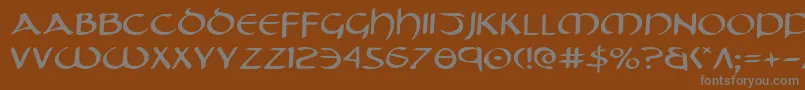 フォントTristrame – 茶色の背景に灰色の文字