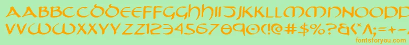 フォントTristrame – オレンジの文字が緑の背景にあります。