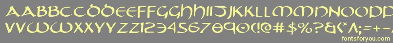 フォントTristrame – 黄色のフォント、灰色の背景