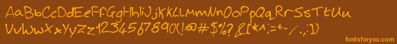 Fonte JoshHandwriting – fontes laranjas em um fundo marrom