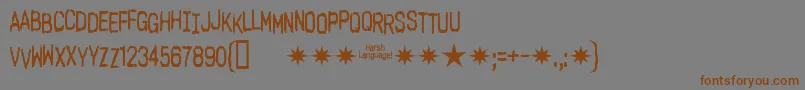 Шрифт Harshlanguageac – коричневые шрифты на сером фоне