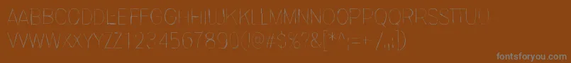 InvisiblerrorFast-Schriftart – Graue Schriften auf braunem Hintergrund