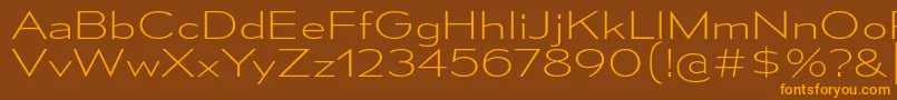 MesmerizeExEl Font – Orange Fonts on Brown Background