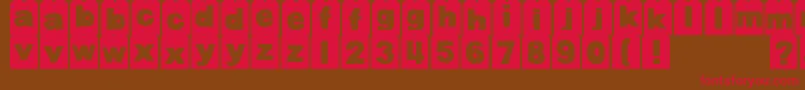 フォントDjbTagged – 赤い文字が茶色の背景にあります。