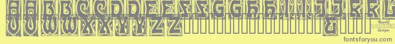 CarmenCaps Font – Gray Fonts on Yellow Background