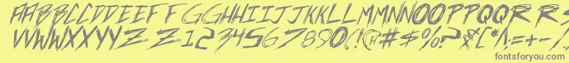 フォントIncubusi – 黄色の背景に灰色の文字