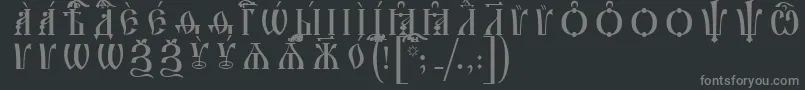 IrmologionCapsUcsSpacedout Font – Gray Fonts on Black Background