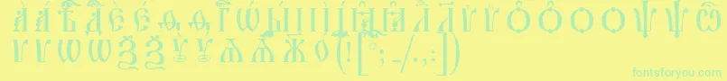 IrmologionCapsUcsSpacedout Font – Green Fonts on Yellow Background