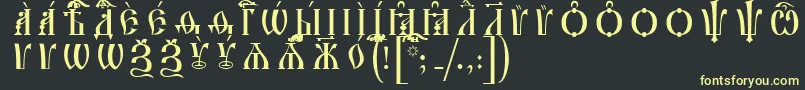 IrmologionCapsUcsSpacedout Font – Yellow Fonts on Black Background