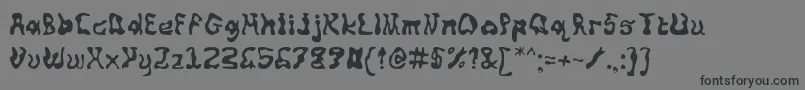 Squiggly-Schriftart – Schwarze Schriften auf grauem Hintergrund