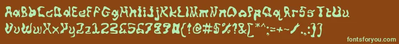 フォントSquiggly – 緑色の文字が茶色の背景にあります。